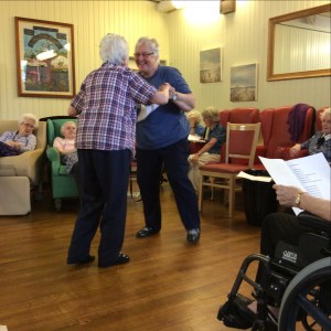 Mary and Janette dancing to "White Cliffs of Dover".